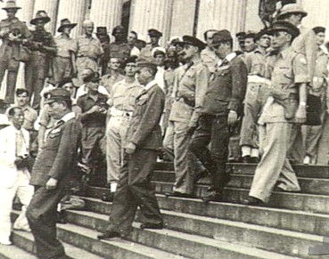 SINGAPORE 1945-09-12 THE JAPANESE PARTY LEAVING THE MUNICIPAL BUILDING SINGAPORE
